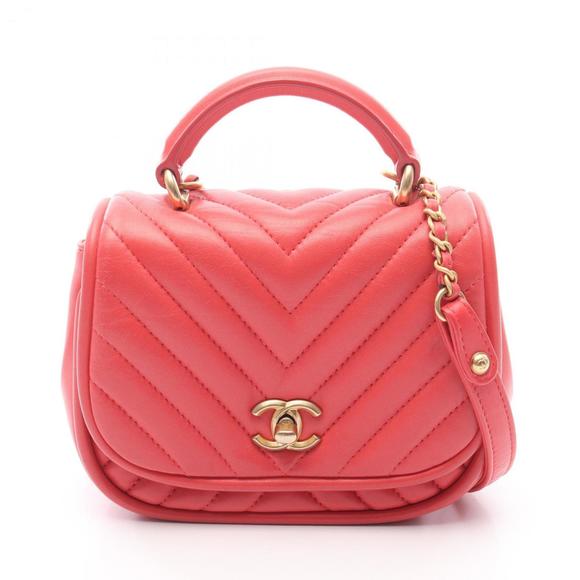 CHANEL Handbags - CHANEL Chevron V-Stitch Shoulder Bag in Lambskin Leather, Women's, Pink